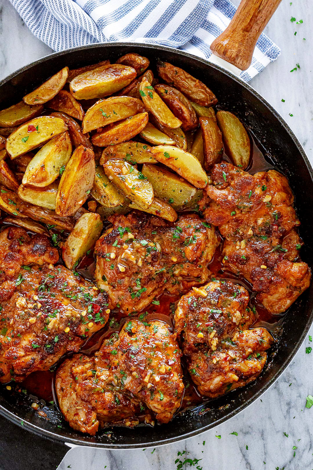 Garlic Butter Chicken Thighs With Baby Potatoes Skillet Recipe Chicken And Potatoes Recipe Eatwell101