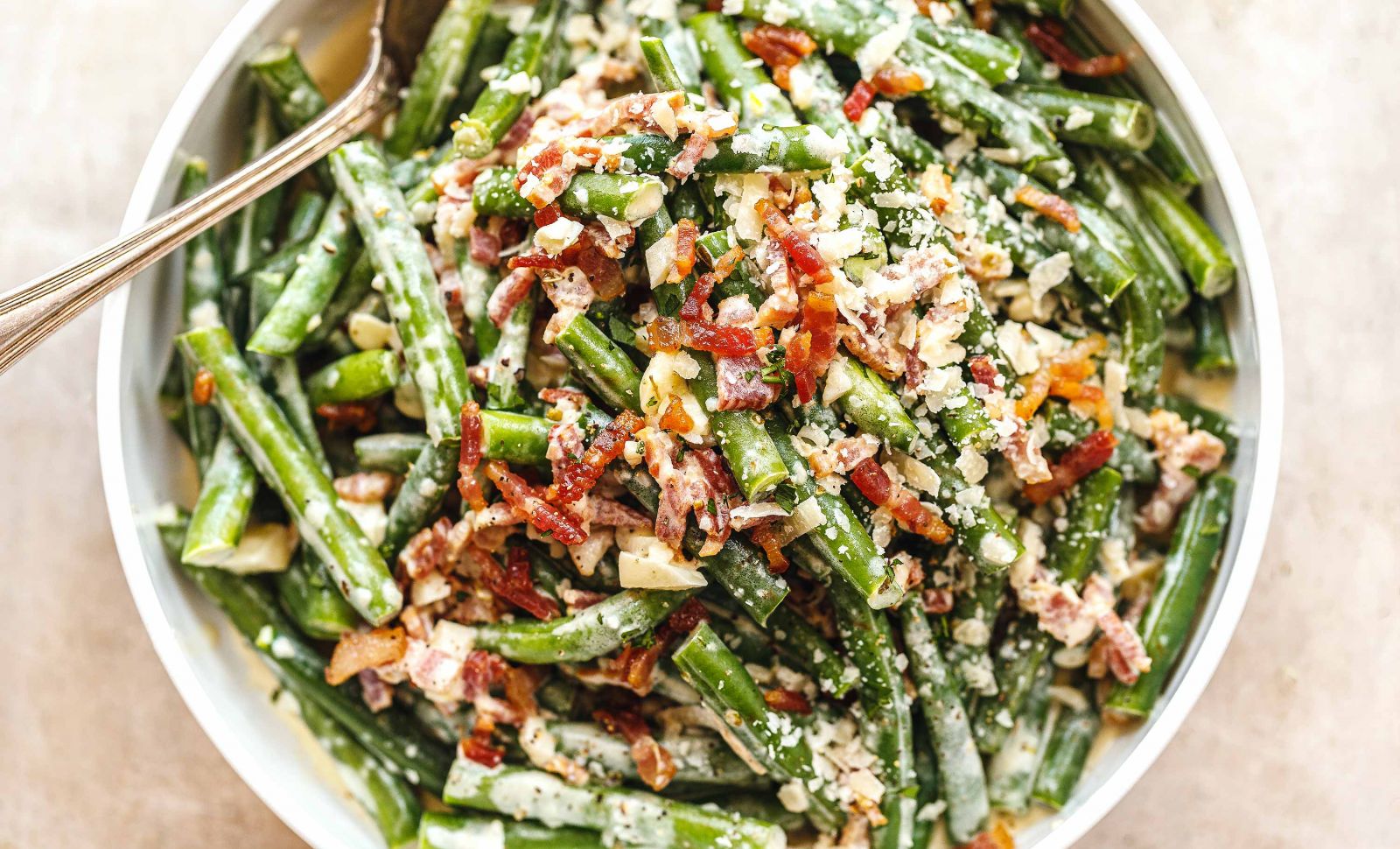 https://www.eatwell101.com/wp-content/uploads/2019/11/Creamy-Parmesan-Green-Beans-Casserole-with-Bacon-1600x970.jpg