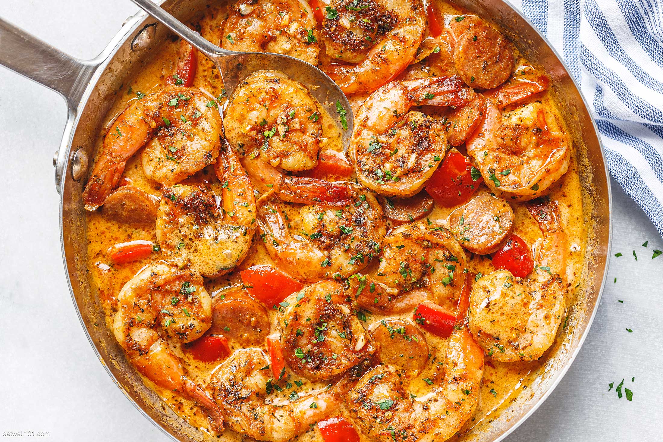 https://www.eatwell101.com/wp-content/uploads/2020/03/Cajun-Shrimp-and-Sausage-recipe.jpg