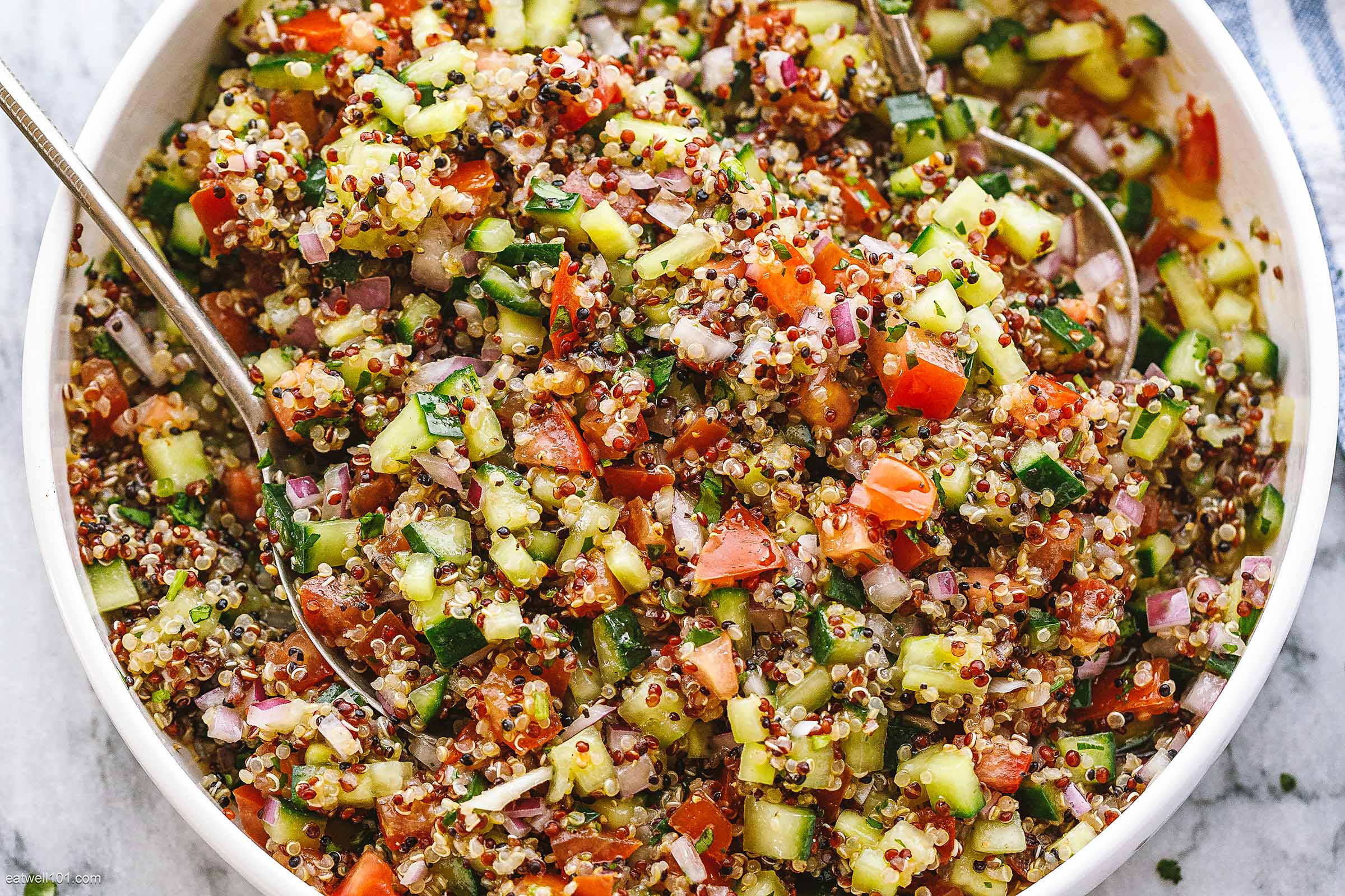 https://www.eatwell101.com/wp-content/uploads/2022/07/quinoa-cucumber-tomato-salad-recipe-1.jpg
