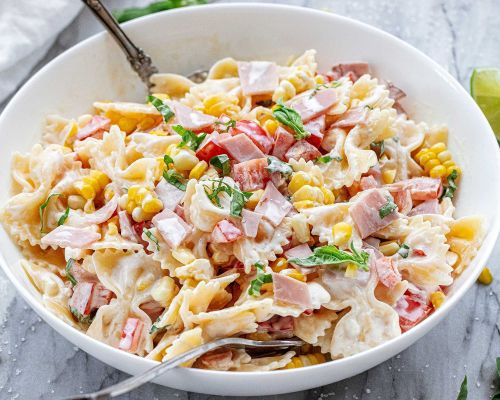 https://www.eatwell101.com/wp-content/uploads/2023/06/potluck-corn-pasta-salad-500x400.jpg